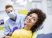 Woman smiling during dental checkup